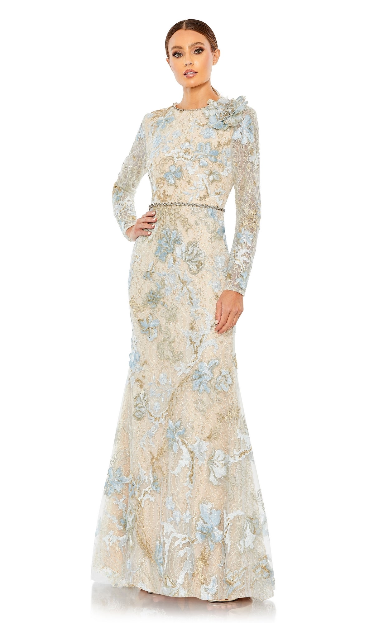 A woman poses in the Mac Duggal Long Formal Dress 11174, a floor-length gown with long sleeves, fitted bodice, and flared skirt in pastel lace of pale blue and beige.